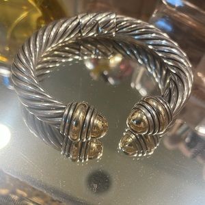 Classic Cable Bracelet
Sterling Silver with 14K Yellow Gold and Gold Domes, 10mm